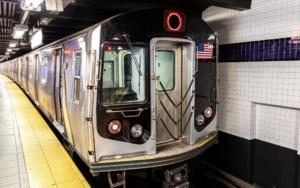 NYC subway train in underground station