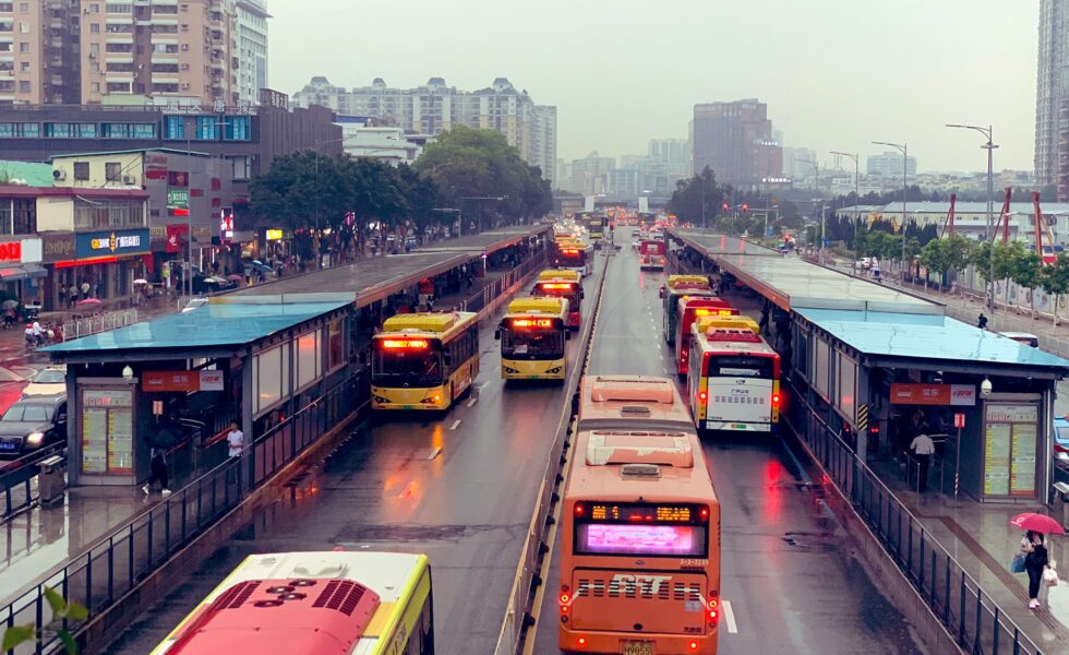 busy public transit stop in Asia