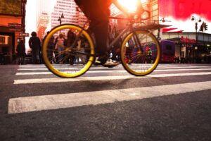 a bike passing over a ped. walkway in NYC