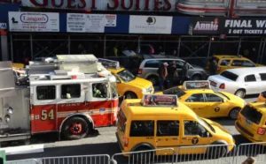 FDNY truck & cabs in traffic