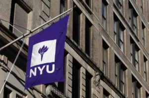 NYU flag outside a building