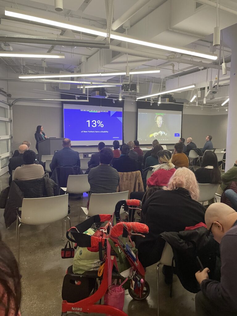 Sarah Kaufman delivering open remarks