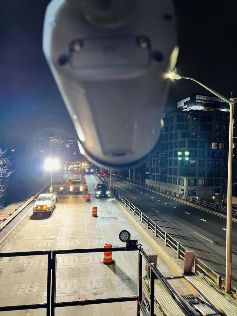 BQE at night behind one of the sensors being installed