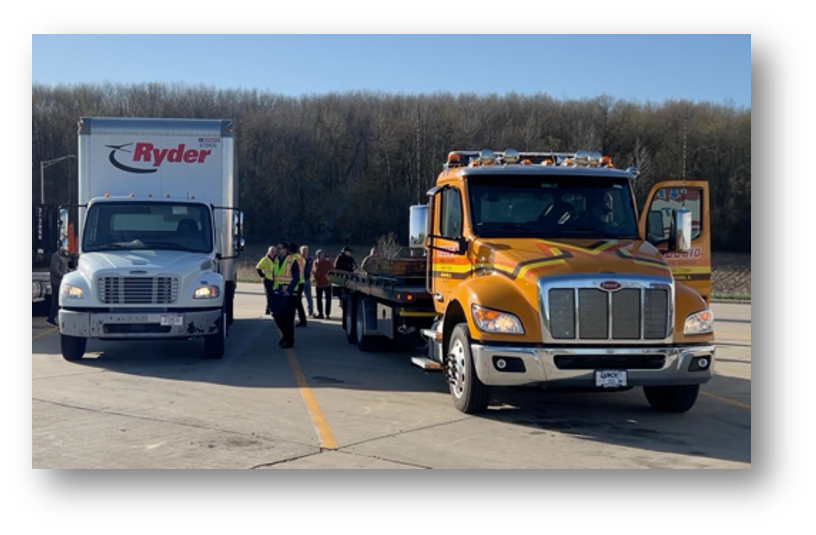 two trucks in a parking lot