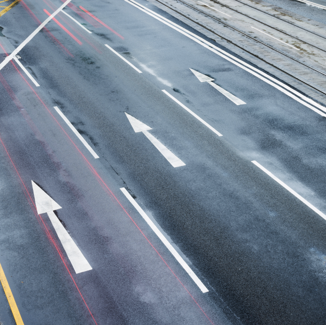 road with several lanes and arrows