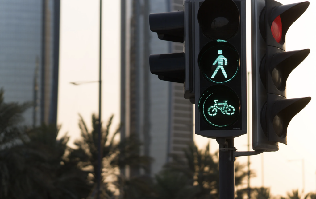 green traffic pedestrian light