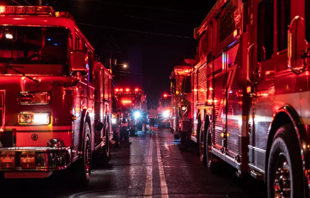 FDNY trucks at night