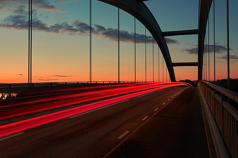 bridge traffic at sunset