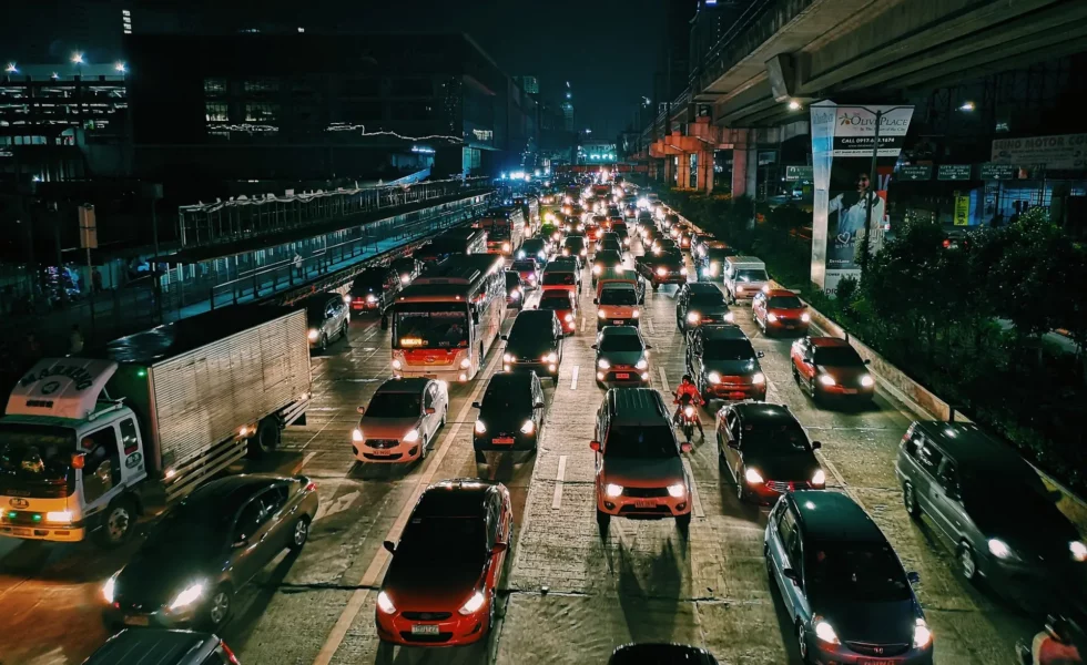 cars in city traffic at night