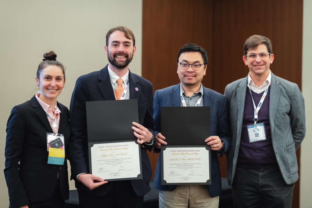 Student researcher Haggai Davis III and Prof. Joe Chow being awarded certificates at TRB
