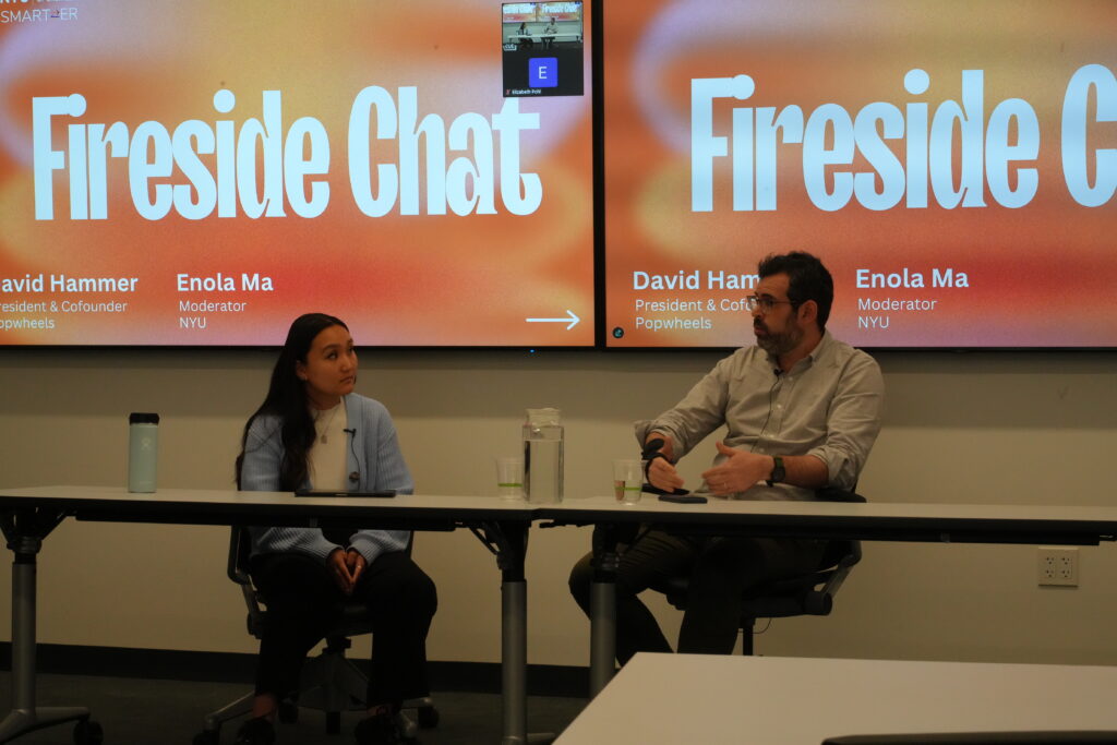 photo of moderator Enola Ma and guest David Hammer speaking at the fireside chat.
