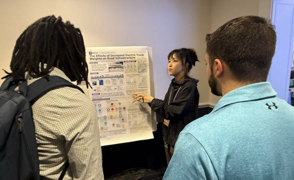 Image of student researcher Zerun Liu presenting her poster at ITS NY.