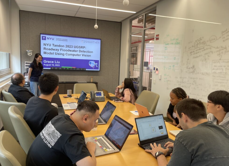 Grace Liu giving her presentation to the group